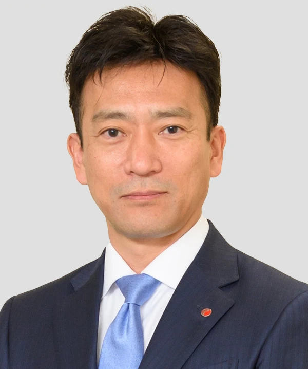 Photograph of Representative Director and President TAKUYA YOSHIDA